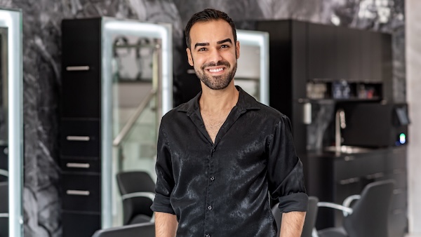 Rycky Smiling to the camera has facial hair