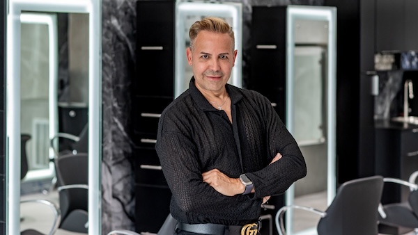 Lyndon our hairstyloist posing to the camera